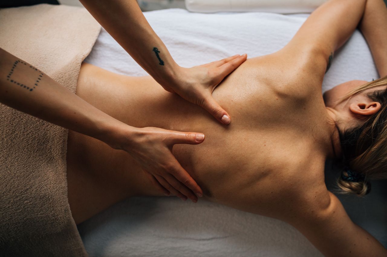 Home A relaxing massage therapy session with a focus on wellness and self-care indoors.